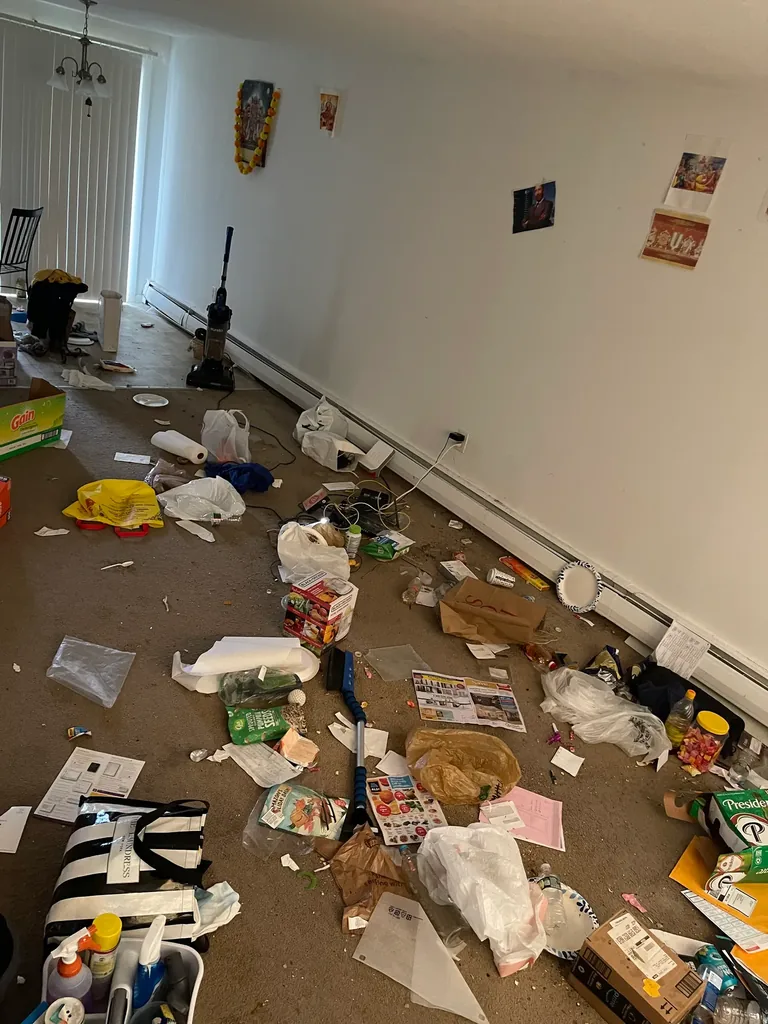 Dirty stained carpet with debris before move-out cleaning